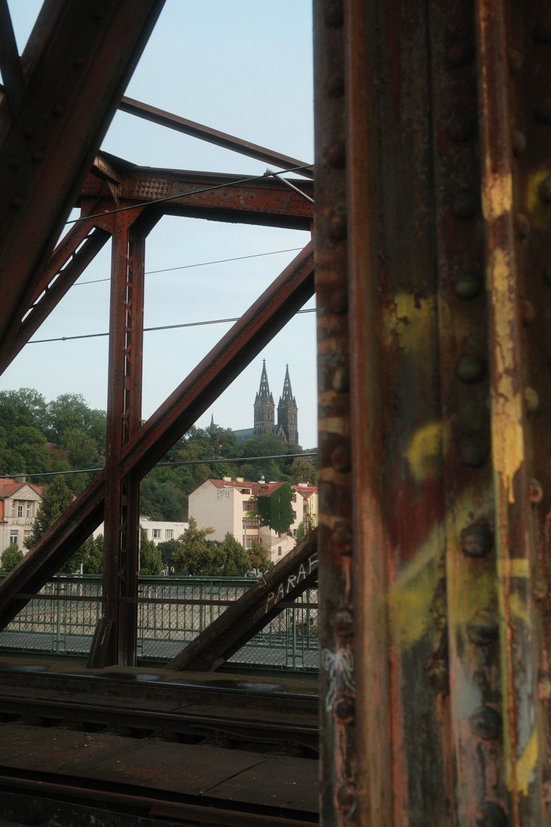 Railway bridge girders and church towers